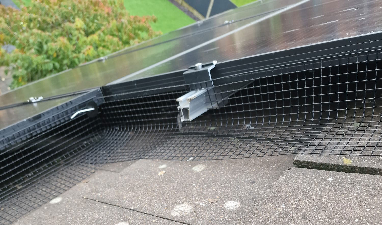 Installing Pigeon Mesh on Solar Panels in Oakwood, Derby